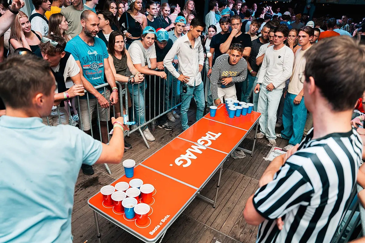 Beer pong table set up with cups in formation